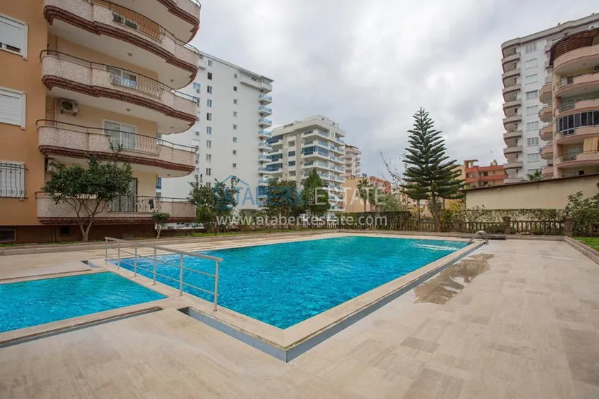 Flat with a partial sea view in a residential complex in Mahmutlar  2 