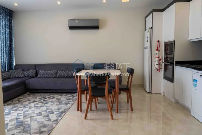 Purchase Furnished flat with mountain and sea views in Mahmutlar 5 