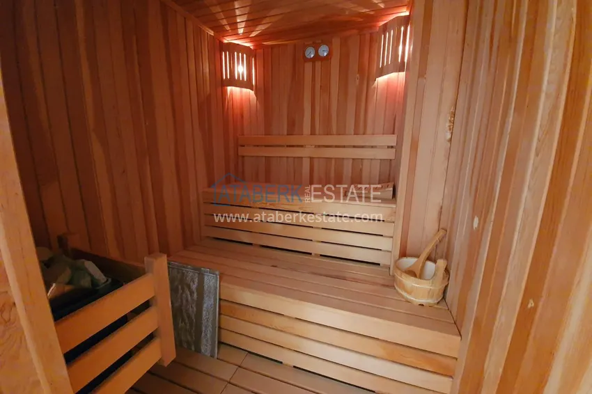 Two level penthouse with 4 bedrooms and a private sauna in Mahmutlar 10 