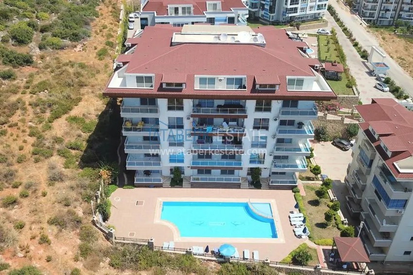 Furnished flat on two levels with a sea view in Kestel 13 