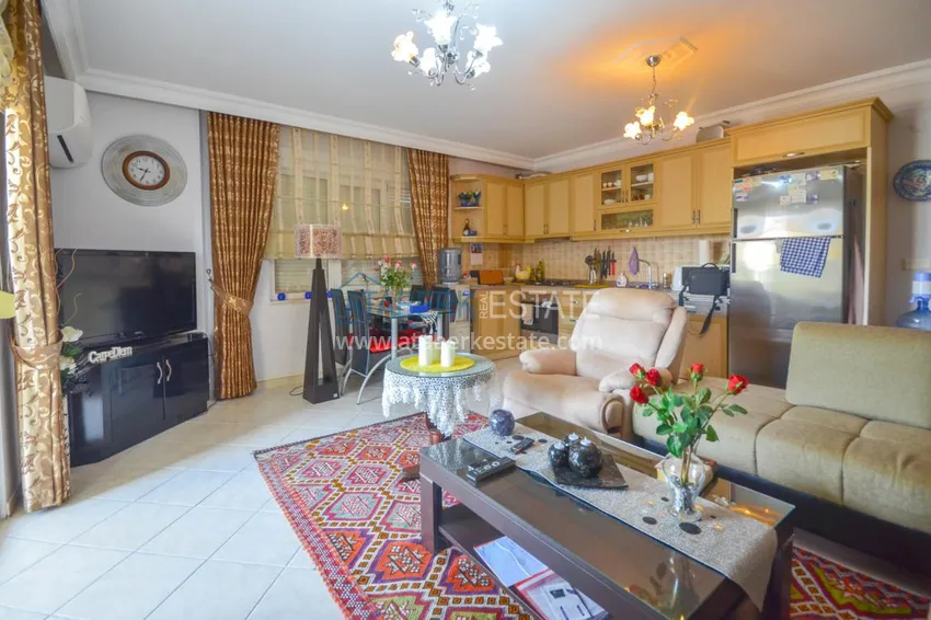 Purchase  Furnished apartment with a glazed balcony in the centre of Mahmutlar  4 