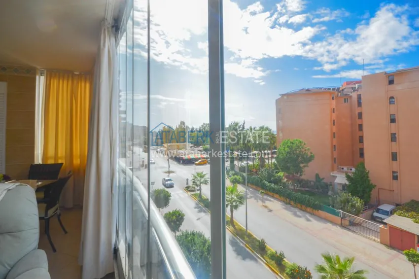 Purchase  Furnished apartment with a glazed balcony in the centre of Mahmutlar  10 