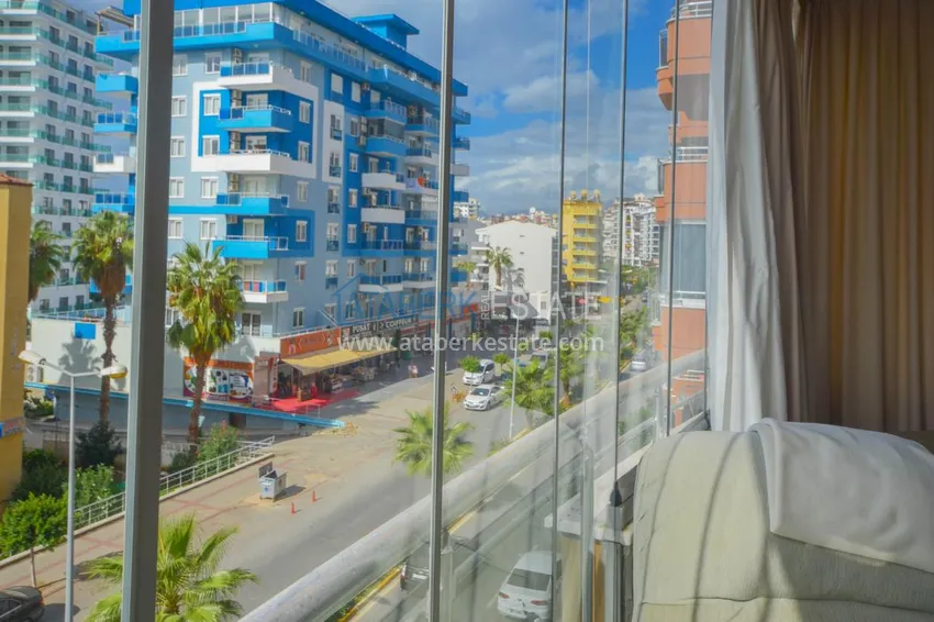 Purchase  Furnished apartment with a glazed balcony in the centre of Mahmutlar  12 