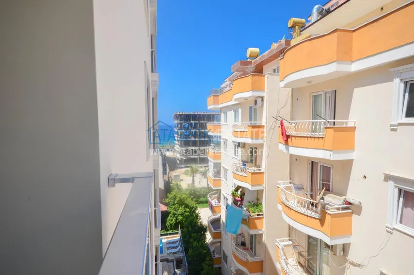 Purchase  Flat in Mahmutlar with a separate kitchen and a partial sea view  13 