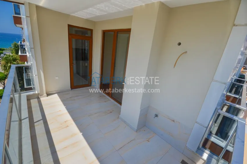 Purchase  Brand new apartment with a separate kitchen and open sea view in Mahmutlar 13 