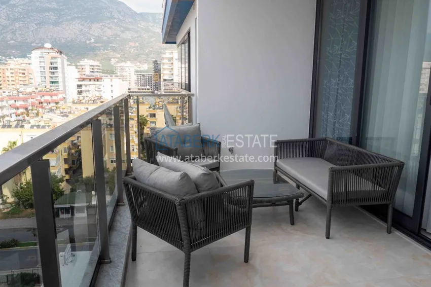 Purchase Furnished flat with mountain and sea views in Mahmutlar 15 
