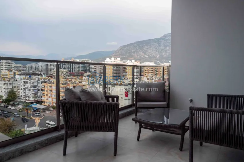 Purchase Furnished flat with mountain and sea views in Mahmutlar 16 