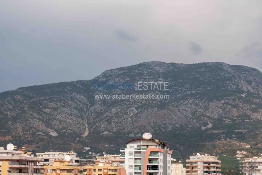 Purchase Furnished flat with mountain and sea views in Mahmutlar 17 