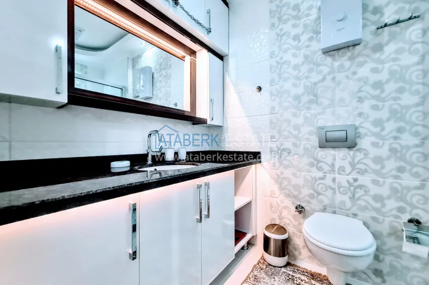 Purchase  Furnished apartment with a glazed balcony in the luxury complex  15 