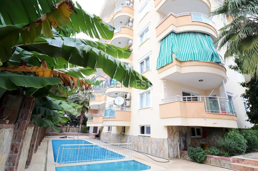 Flat with a modern design in the complex by the sea in Mahmutlar  4 