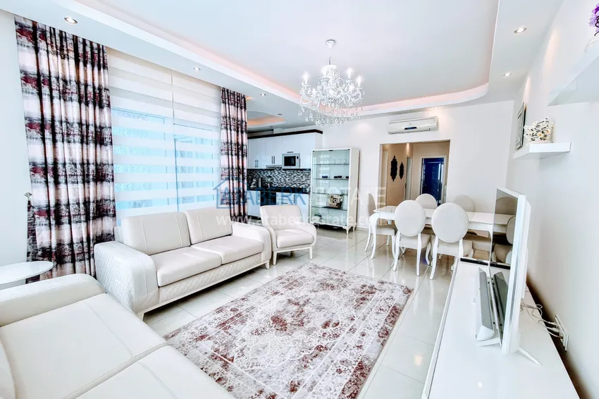Purchase  Furnished apartment with a glazed balcony in the luxury complex  4 