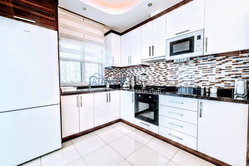 Purchase  Furnished apartment with a glazed balcony in the luxury complex  9 