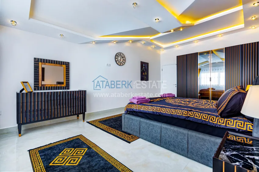 Purchase  Penthouse in Mahmutlar — elegant interior, separate kitchen, side sea view  10 