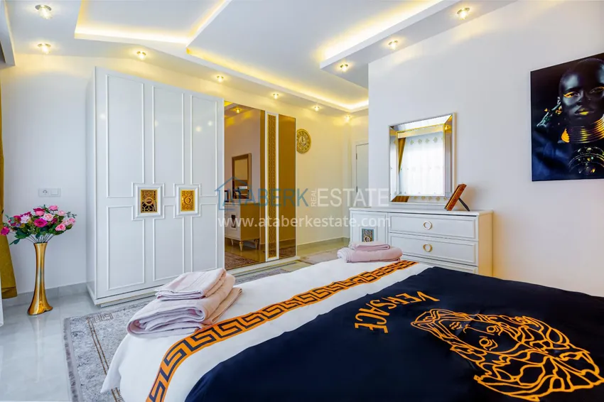 Purchase  Penthouse in Mahmutlar — elegant interior, separate kitchen, side sea view  11 