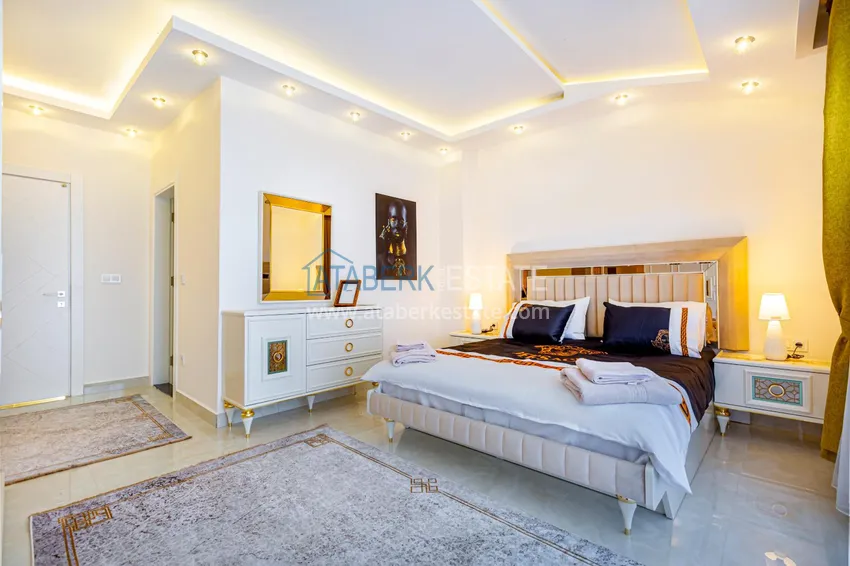 Purchase  Penthouse in Mahmutlar — elegant interior, separate kitchen, side sea view  12 