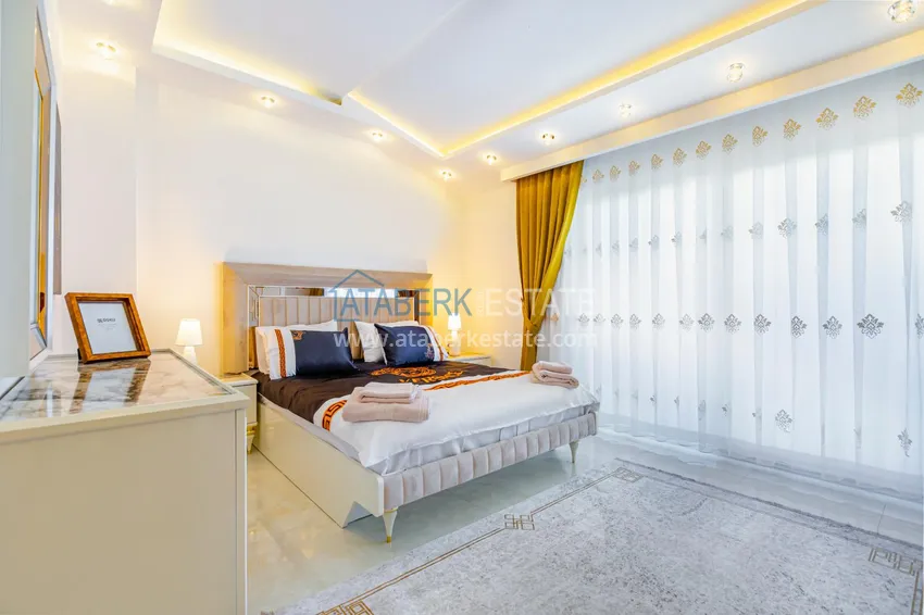 Purchase  Penthouse in Mahmutlar — elegant interior, separate kitchen, side sea view  13 
