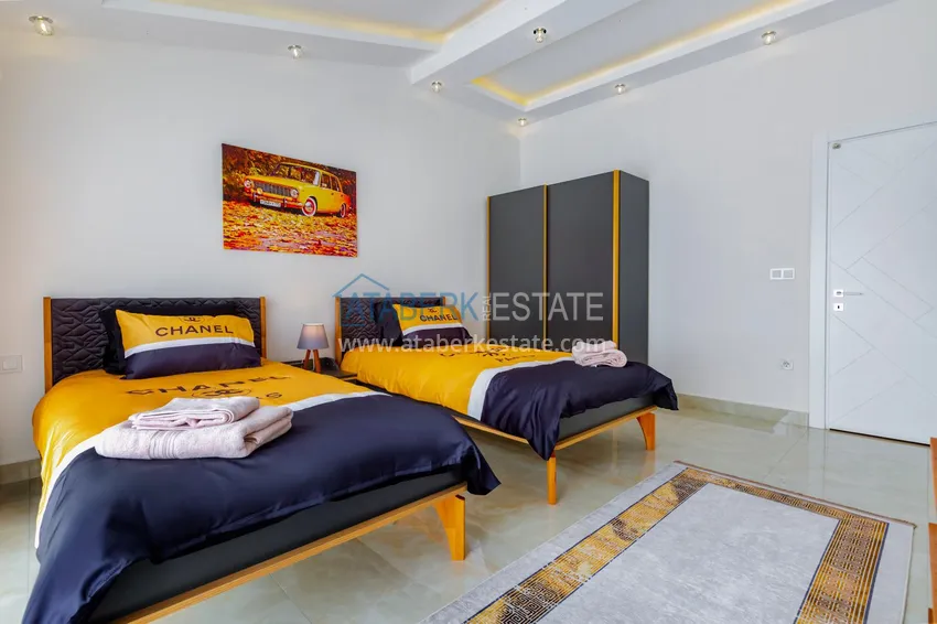 Purchase  Penthouse in Mahmutlar — elegant interior, separate kitchen, side sea view  15 