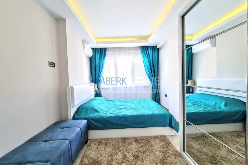 Purchase  Furnished two bedroom apartment with an open view in Mahmutlar  14 