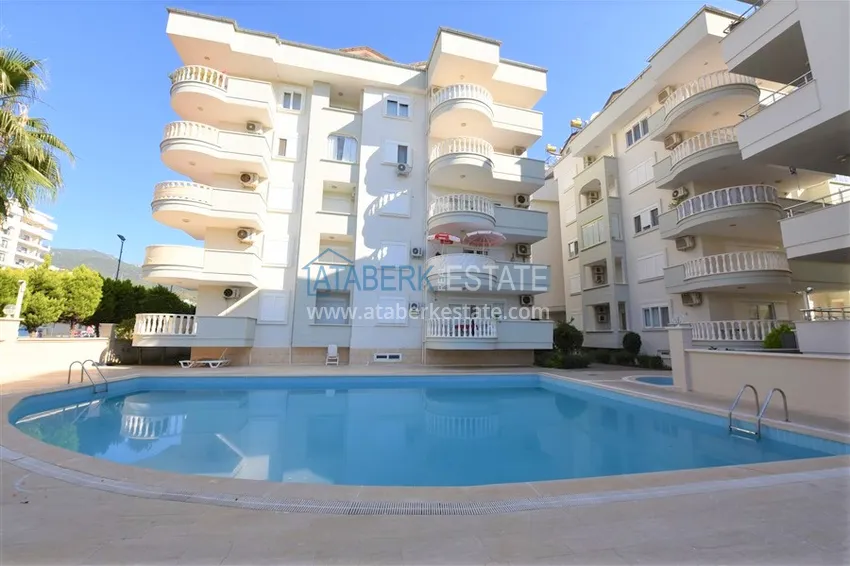 Three-room apartment in Oba with a glazed balcony and a sea view 1 