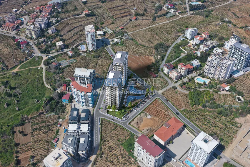 New investment project of a multi-apartment residential complex in Mahmutlar 21 