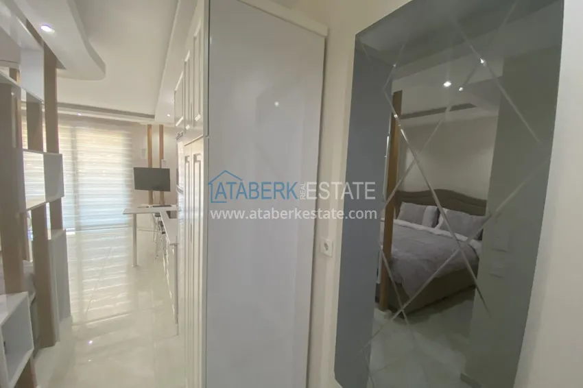 Purchase  Rent a studio in Mahmutlar with furniture in a complex on the first coastline B42 1 