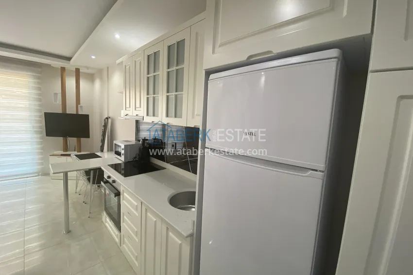 Purchase  Rent a studio in Mahmutlar with furniture in a complex on the first coastline B42 2 