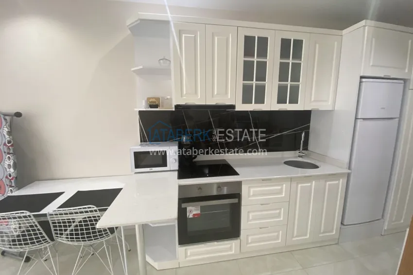 Purchase  Rent a studio in Mahmutlar with furniture in a complex on the first coastline B42 3 