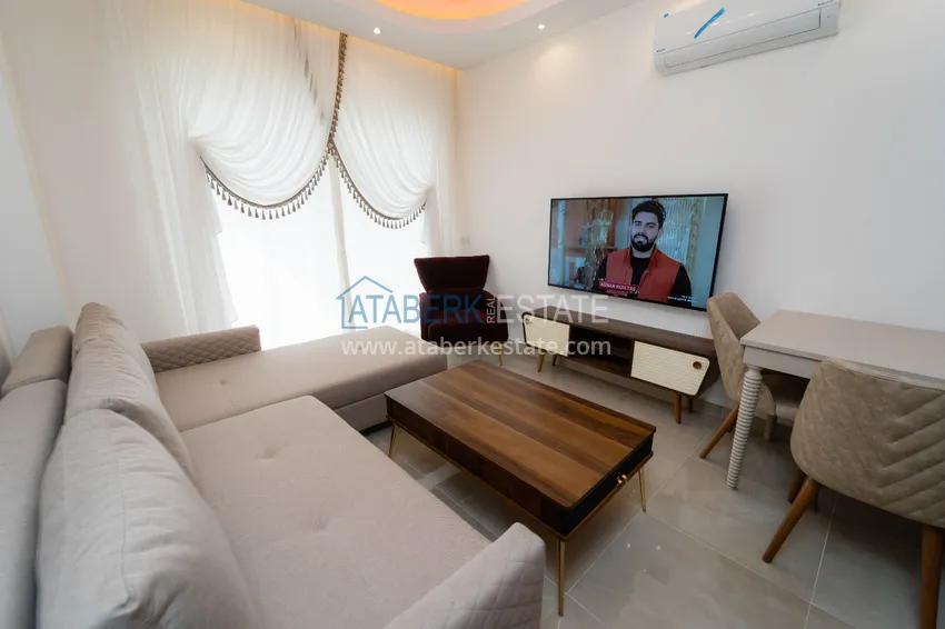 Purchase Apartments in Mahmutlar with new furniture in a well – maintained complex 16 