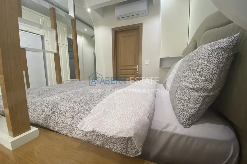 Purchase  Rent a studio in Mahmutlar with furniture in a complex on the first coastline B42 8 