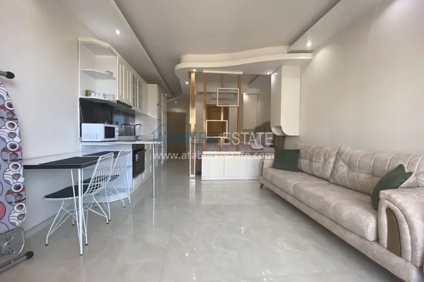 Purchase  Rent a studio in Mahmutlar with furniture in a complex on the first coastline B42 15 