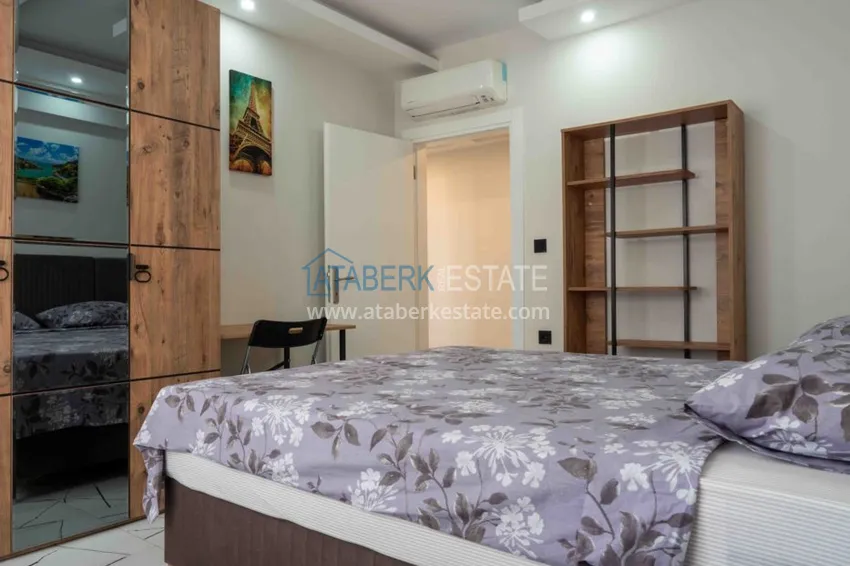 Purchase Rent in the best area of Alanya - two-bedroom apartment by the sea in the city center No. 18 13 