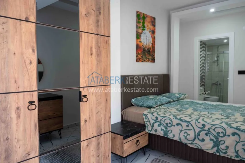 Purchase Rent in the best area of Alanya - two-bedroom apartment by the sea in the city center No. 18 18 