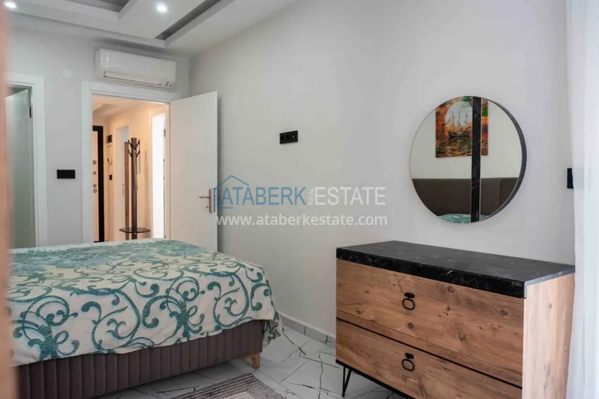 Purchase Rent in the best area of Alanya - two-bedroom apartment by the sea in the city center No. 18 19 