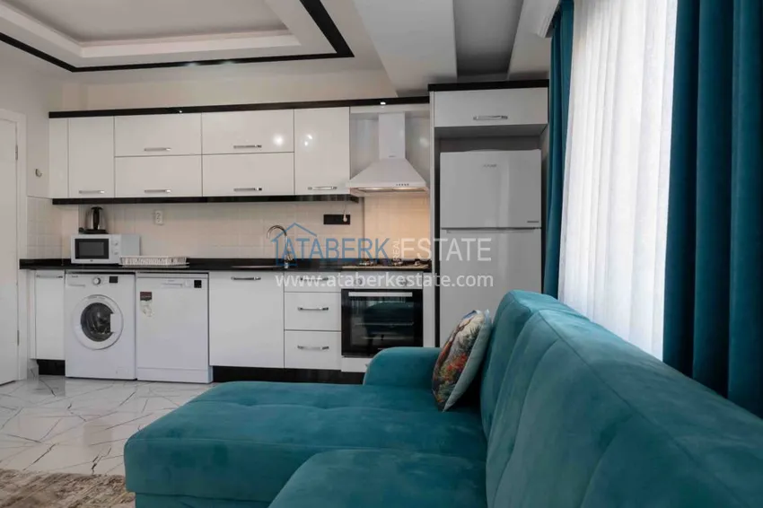 Purchase Rent in the best area of Alanya - two-bedroom apartment by the sea in the city center No. 18 23 
