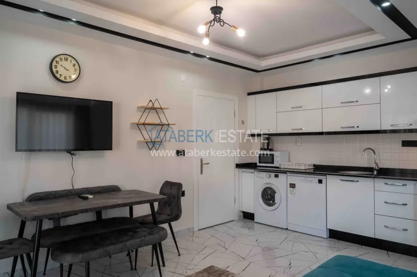 Purchase Rent in the best area of Alanya - two-bedroom apartment by the sea in the city center No. 18 24 