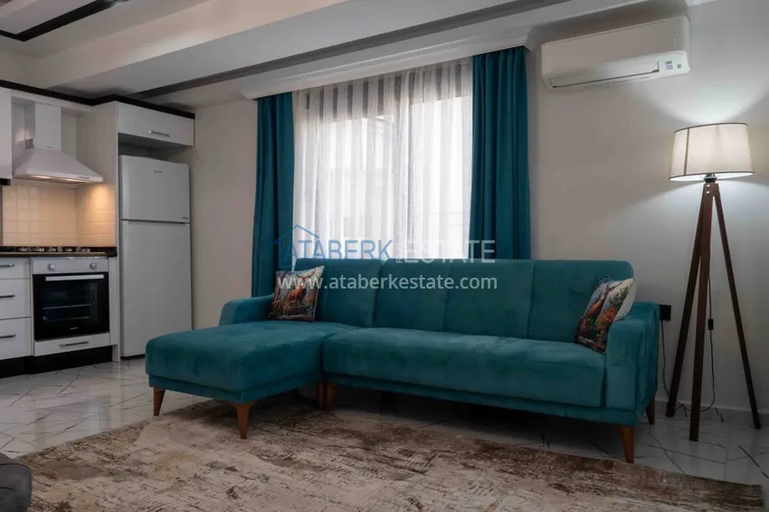 Purchase Rent in the best area of Alanya - two-bedroom apartment by the sea in the city center No. 18 25 