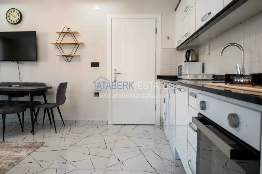 Purchase Rent in the best area of Alanya - two-bedroom apartment by the sea in the city center No. 18 28 