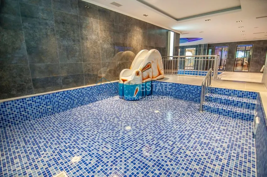 Brand new apartment in Mahmutlar in a modern multi-apartment new building 11 