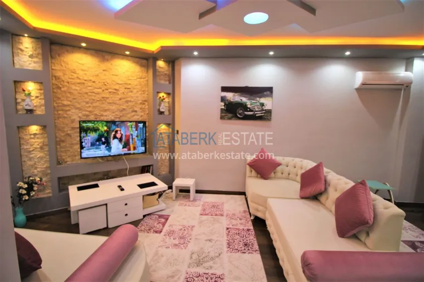 Purchase  Two-room apartment in Mahmutlar with furniture and a glazed balcony 10 