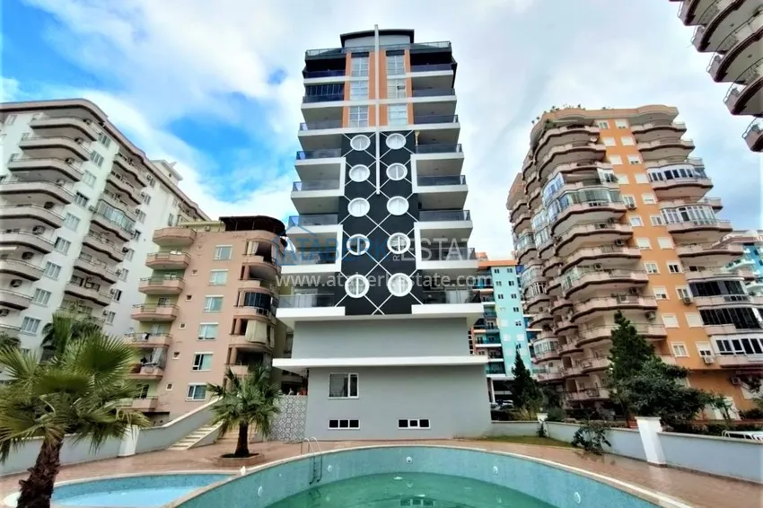 Furnished apartment in Mahmutlar in a young complex 1 