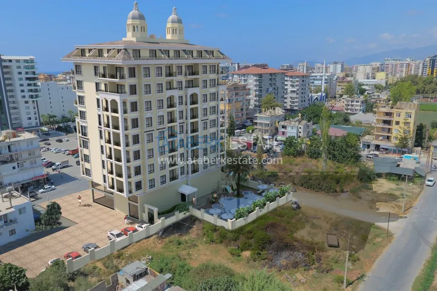 A new project of a multi-apartment residential complex in the very center of Mahmutlar 1 