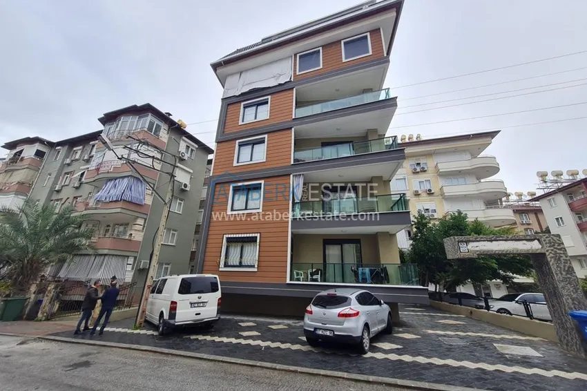 Three-room apartment in the center of Alanya with a separate kitchen 1 