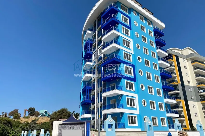 Apartments in Mahmutlar with new furniture in a modern complex 1 