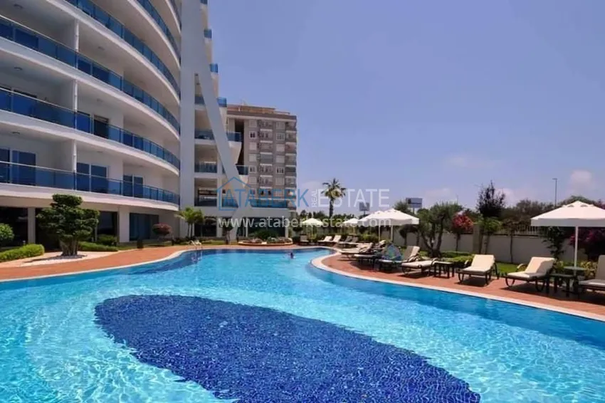 Apartment in Mahmutlar with furniture in a premium class complex on the first line 9 