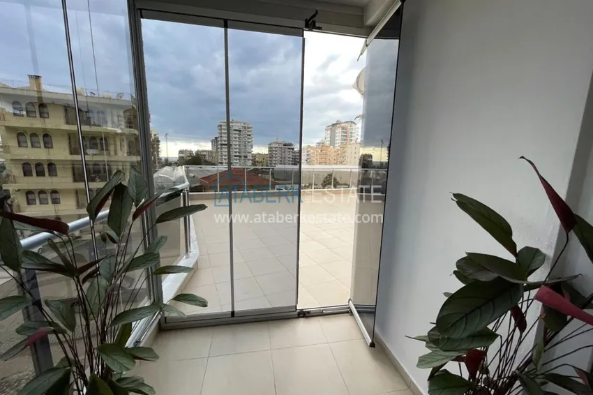 Purchase  Apartment in Mahmutlar with furniture, glazed balcony and very spacious terrace 13 