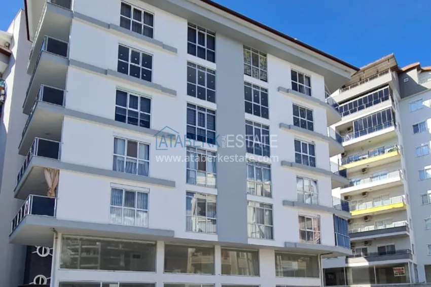 Three-room apartment in Mahmutlar with a separate kitchen 1 