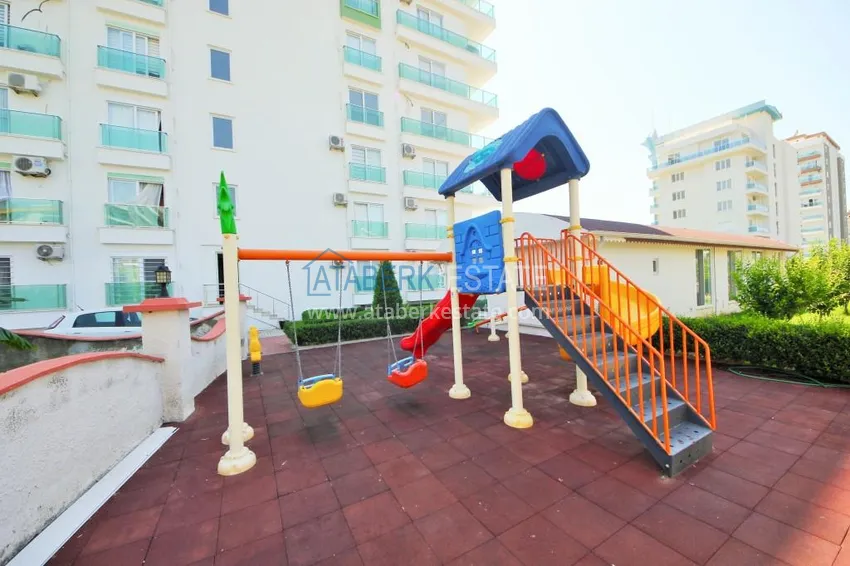 Furnished two-room apartment in Mahmutlar in a comfortable complex 4 