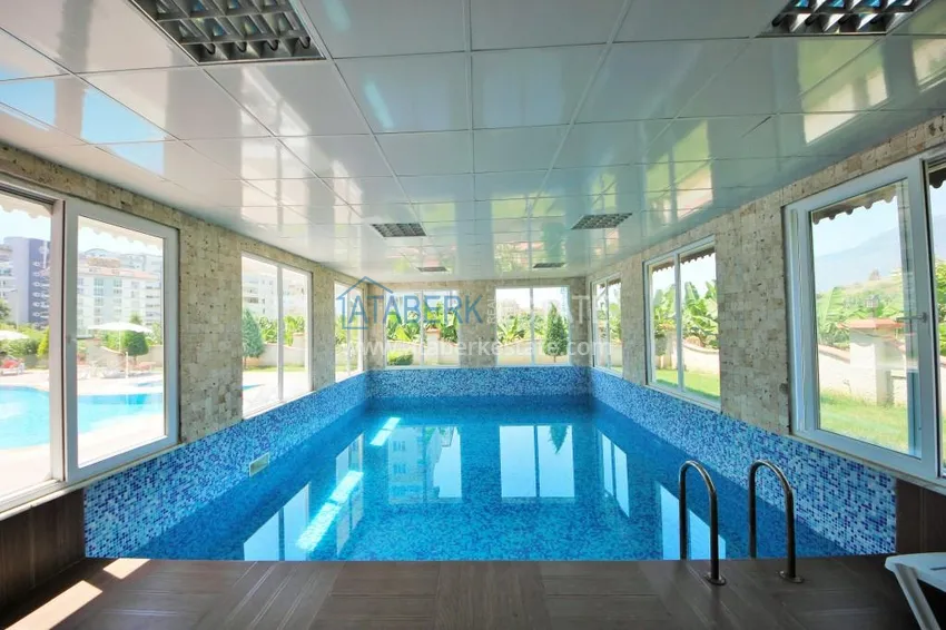 Furnished two-room apartment in Mahmutlar in a comfortable complex 8 