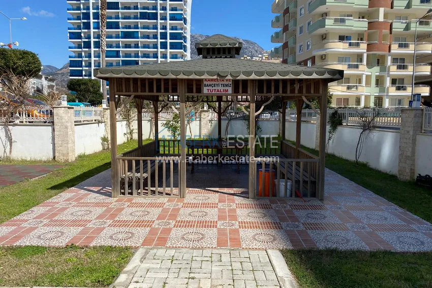 Three-room apartment in Mahmutlar with a view of the sea and mountains 11 