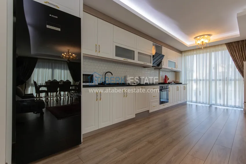 Purchase Duplex in Mahmutlar with furniture and sea and mountain views in a new complex 12 